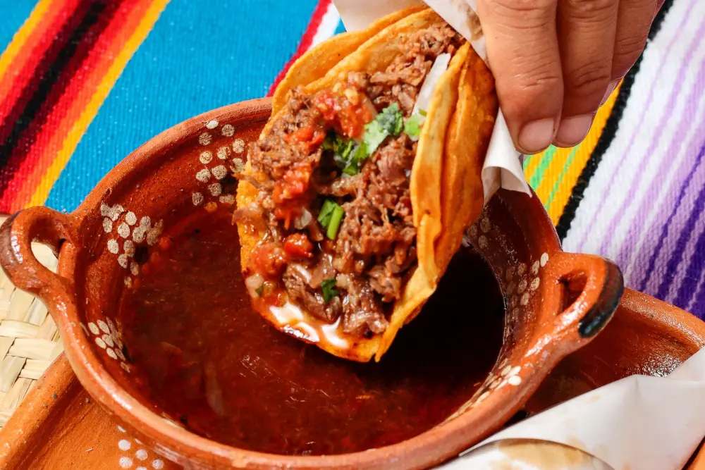 Traditional Mexican tacos with beef, salsa and cilantro